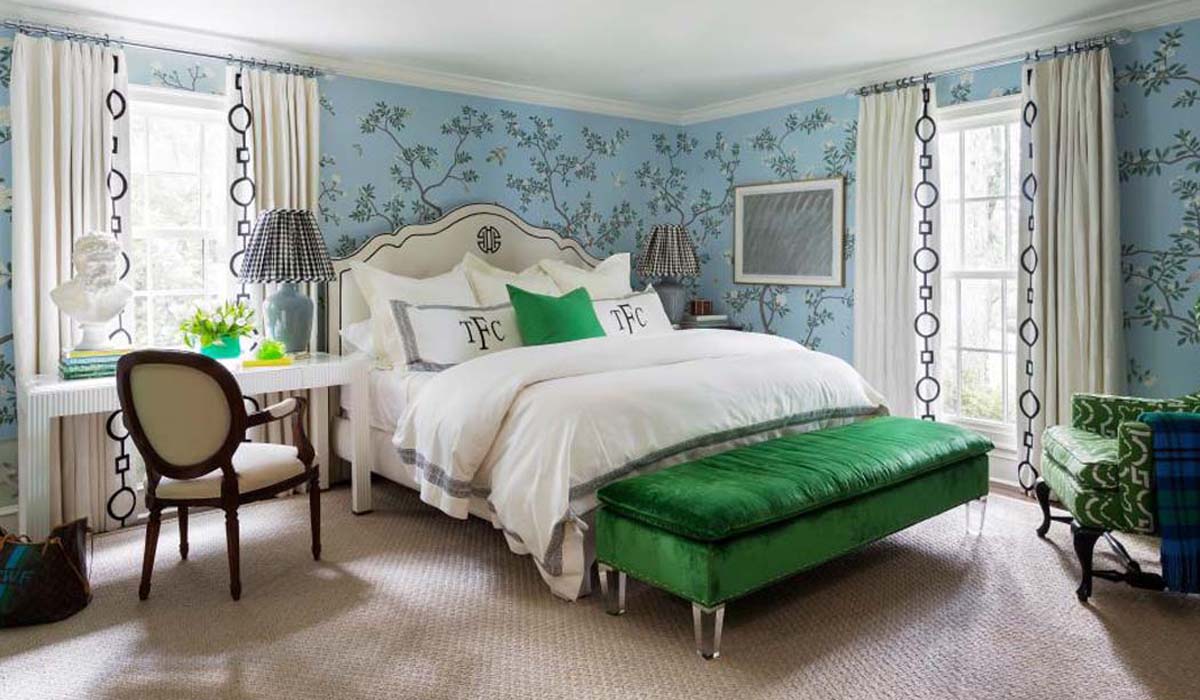 Patterned wallpaper adding texture and color to a furnished room